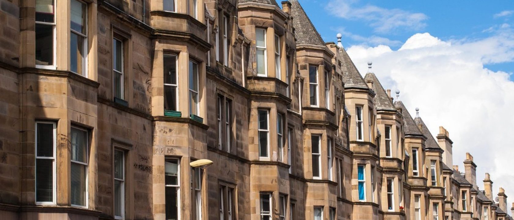 Traditional Edinburgh sandstone tenement buildings with bay windows, photographed by Nicola Ferrari RF.