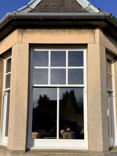 The same Portobello bay window after full restoration and double-glazing upgrade.