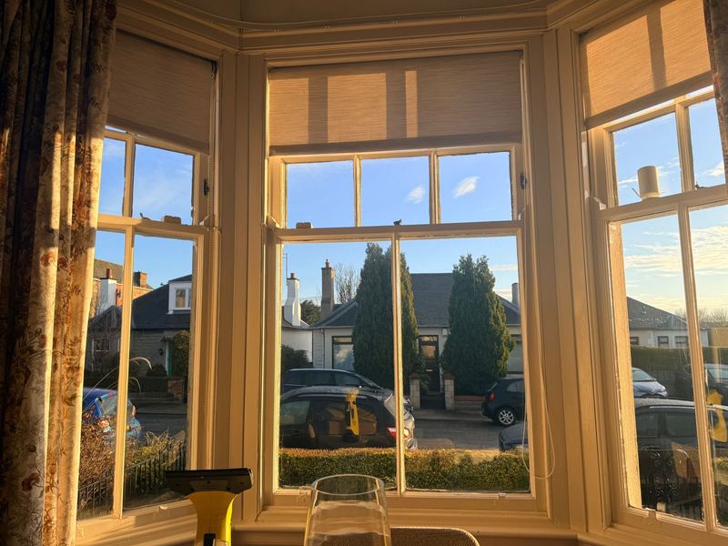 Interior view of the Portobello bay window before works, showing original sashes.